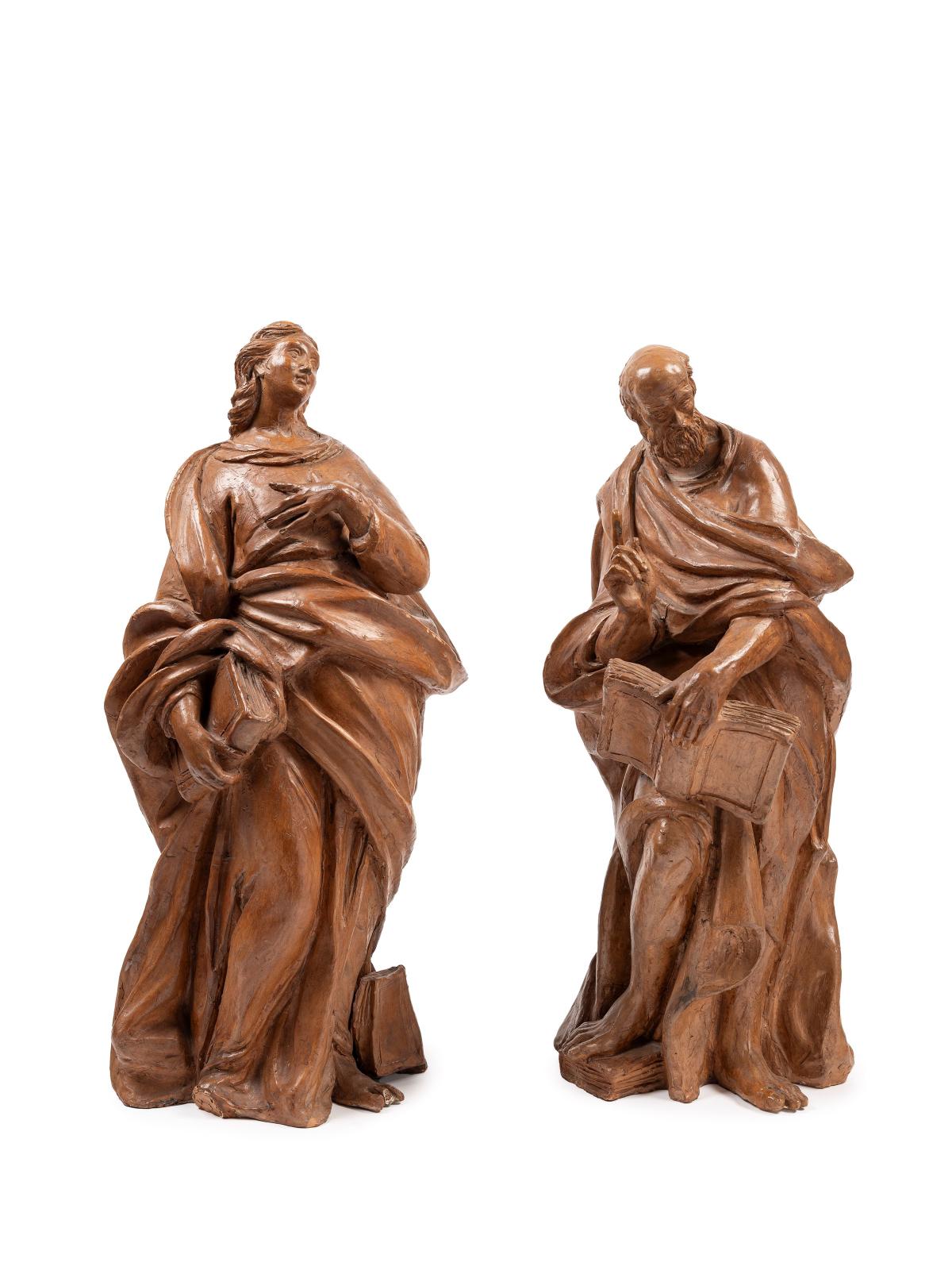 Coppia sculture in terracotta con basi