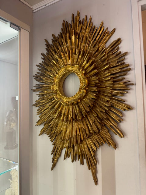 Cornice dorata a raggi